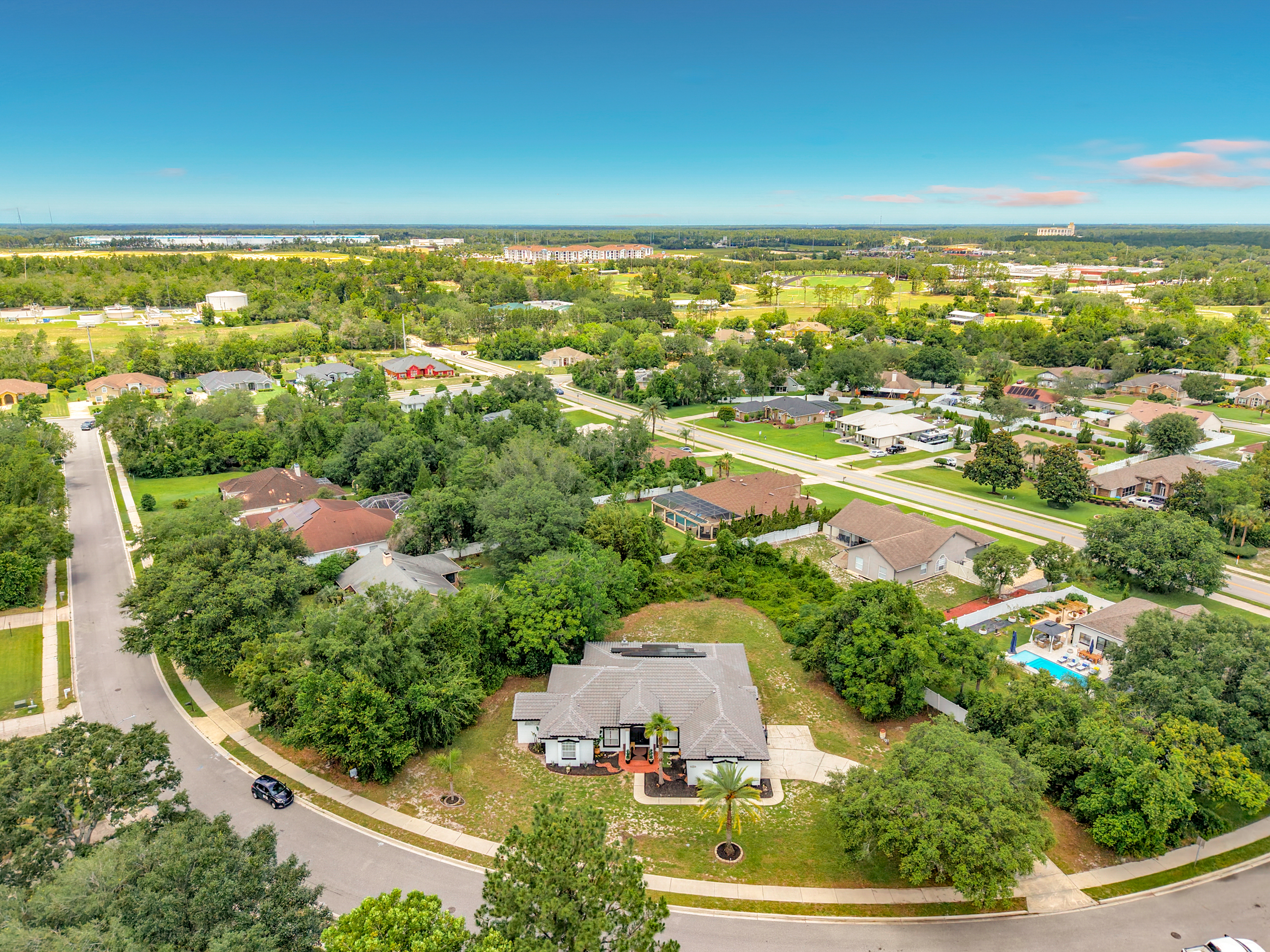 Drone aerial view of 1043 W Seagate Dr and surrounding neighborhood